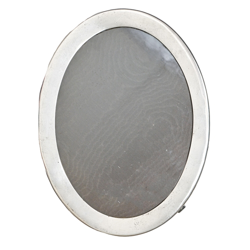 301 - A George V oval silver photograph frame, backed on oak, 25cm, marks rubbed, Birmingham 1921... 