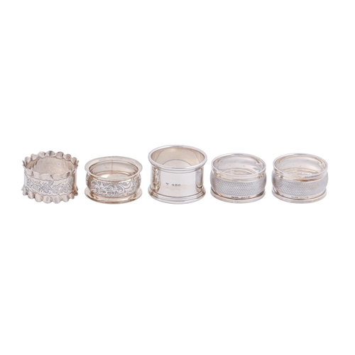 307 - Three and a pair of silver napkin rings, Victorian - George V, various makers, 2ozs 8dwts... 