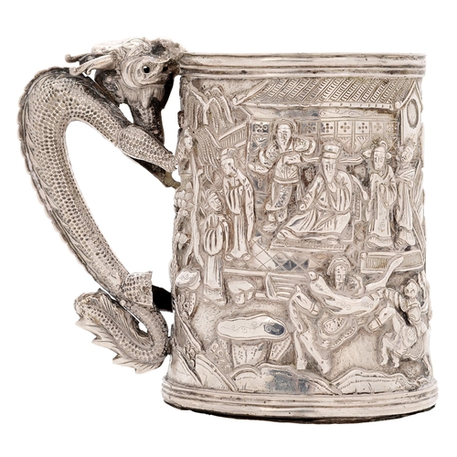 319 - A Chinese silver repousse mug, 19th c,  with dragon handle, 83mm h, marked HC, 4ozs 16dwts... 