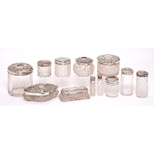 374 - Miscellaneous, mainly Edwardian, glass jars, bottles, trinket and other boxes with silver covers or ... 