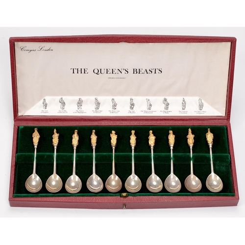 376 - The Queen's Beasts. A set of ten Elizabeth II Royal Silver Wedding parcel gilt commemorative spoons,... 