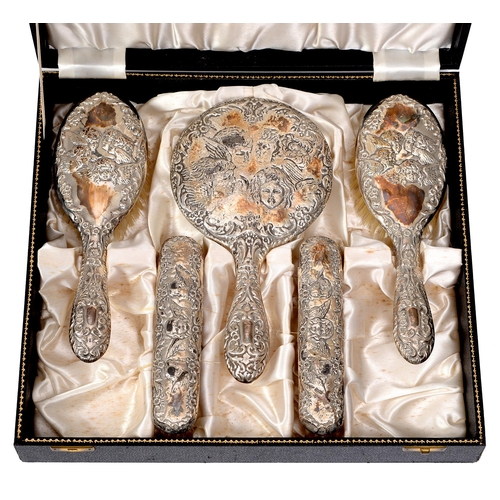 381 - An Elizabeth II five piece silver brush set, marks rubbed, Birmingham 1958, cased