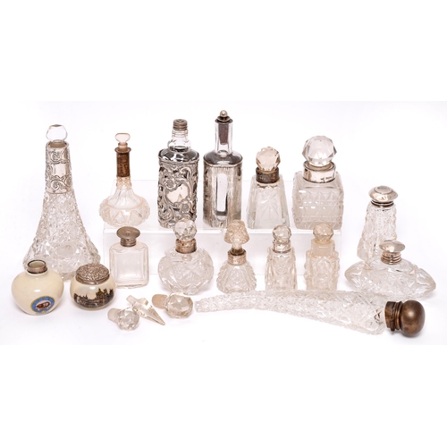 382 - Miscellaneous Edwardian and early 20th c silver mounted cut glass scent bottles and jars, and other ... 