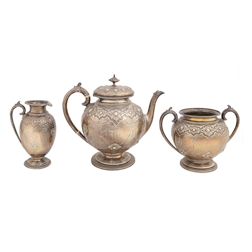 386 - A Victorian silver tea service, of ovoid design, chased and engraved with festoons and strapwork in ... 