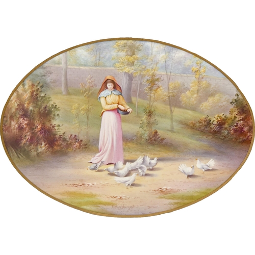 497 - An English porcelain plaque, early 20th c, painted by F Micklewright, signed, with a young woman fee... 