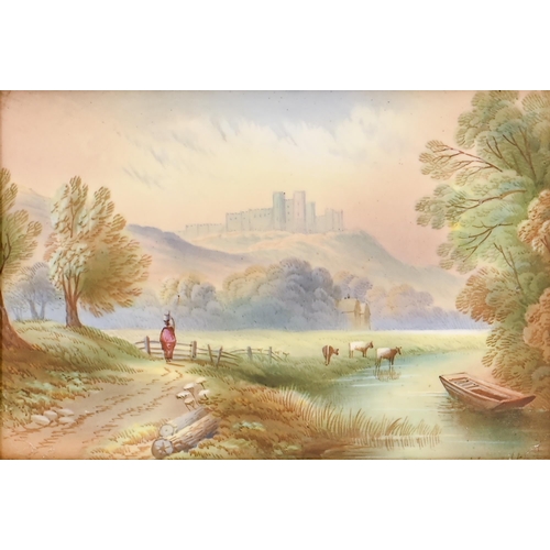 502 - A pair of English porcelain plaques, early 20th c, painted by F Micklewright, one signed, with a lan... 