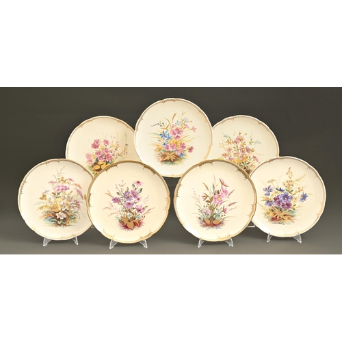 517 - A set of seven Crown Derby dessert plates, 1884, painted with wild flowers on a primrose ground, 23c... 