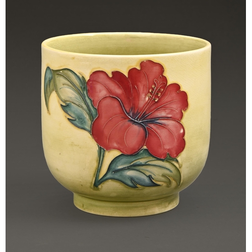 530 - A Moorcroft Hibiscus cache pot, c.1975-85, with yellow ground, 13cm h, impressed marks, painted init... 