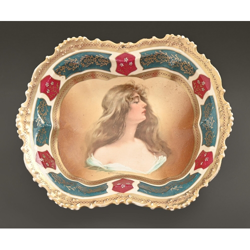 532 - A Vienna style dish, early 20th c, printed and painted with the head of a raven haired beauty, 25cm ... 