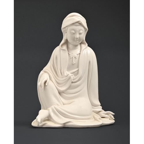 545 - A Chinese blanc de chine figure of Guanyin, 20th c, 20cm h