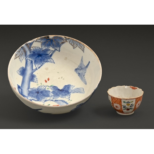 549 - A Japanese porcelain bowl, Meiji period, painted in underglaze blue and overglaze enamels with birds... 