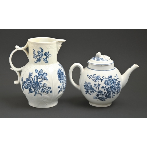 567 - A Worcester blue and white teapot and a cover and cabbage leaf moulded mask jug, c1770 and c1780, tr... 