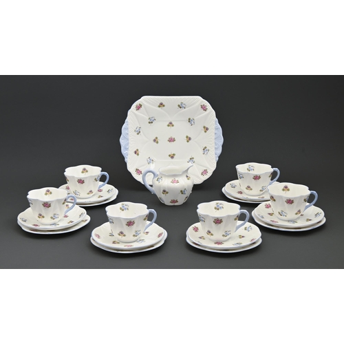 598 - A Shelley bone china tea service, mid 20th c, Dainty shape, decorated with scattered flowers, red pl... 