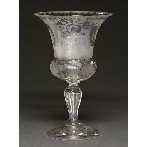 658 - A wheel engraved glass goblet, French or Bohemian, mid 19th c, the bell bowl with a continuous scene... 