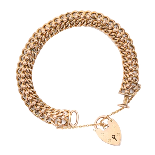 72 - A gold bracelet and padlock, 17cm l, marked on padlock 9c, 17.8g