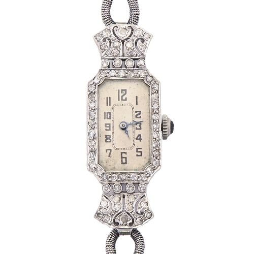 76 - A diamond cocktail watch, c1930, pave set, the lugs articulated, in platinum, 14 x 40mm, on looped m... 