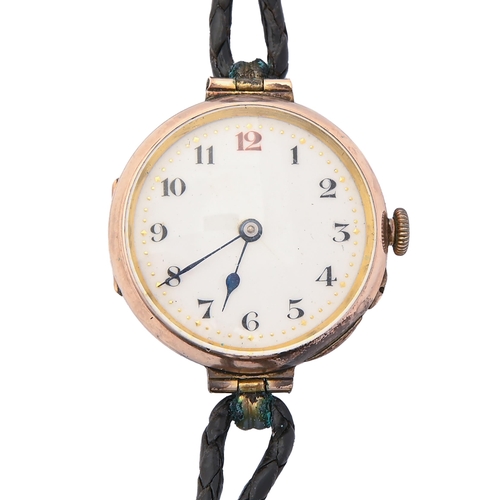 77 - A 9ct gold lady’s wristwatch, 26mm diam, import marked London 1934, leather strap, 19.5g... 