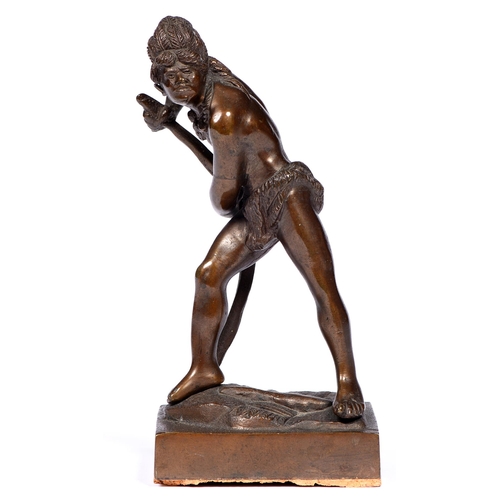 801 - A bronze statuette of a native American bending his bow, early 20th c, even light brown patina, 17.5... 