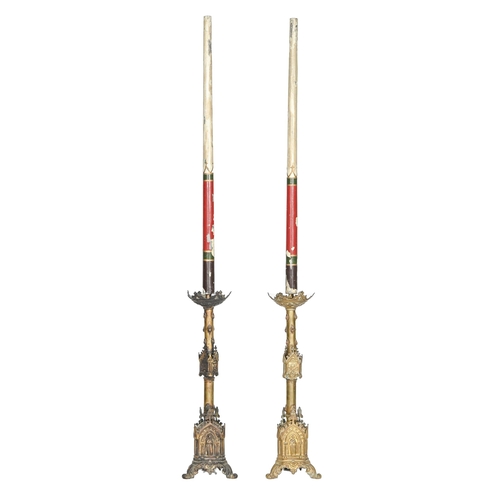 896 - A pair of French Gothic Revival lacquered brass altar candlesticks, late 19th c, 57cm h... 