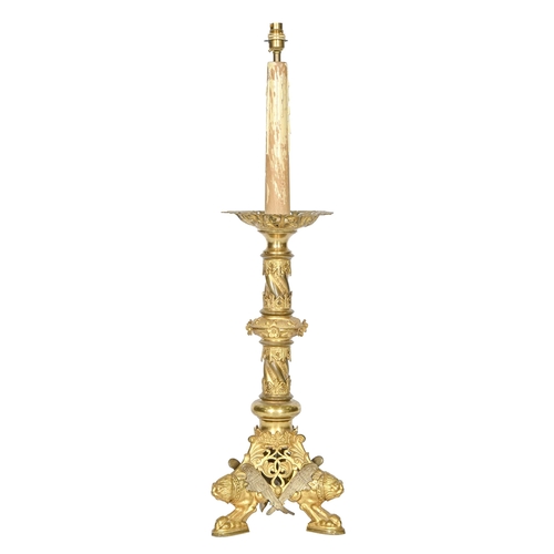 897 - A French Gothic Revival gilt lacquered brass altar candlestick, late 19th c, 60cm h, adapted as a la... 