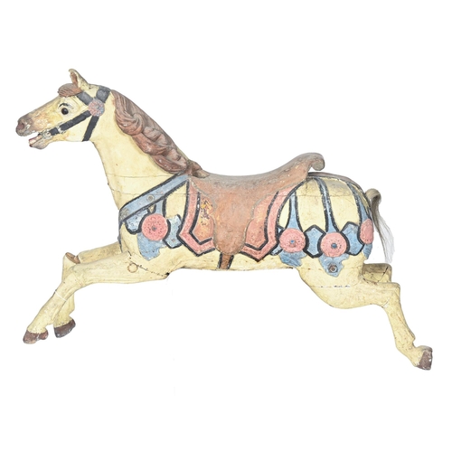 925 - A 19th c French painted wood carousel horse, 128cm w, 85cm h