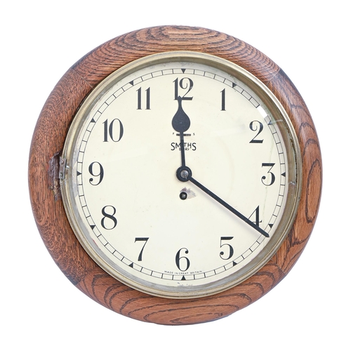 930 - A Smith's oak eight day wall clock, with painted dial, 40cm diam