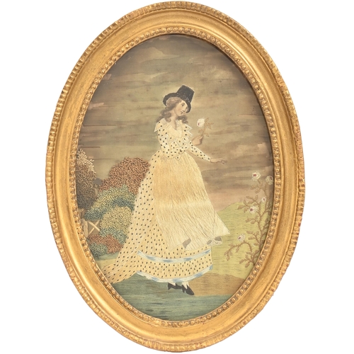 969 - A George III silk needlework picture of a young lady picking flowers, in oval giltwood and compositi... 