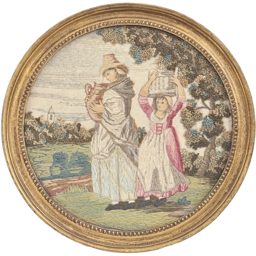 970 - A George III woolwork picture of two girls fetching water, in giltwood and composition frame, 24cm d... 