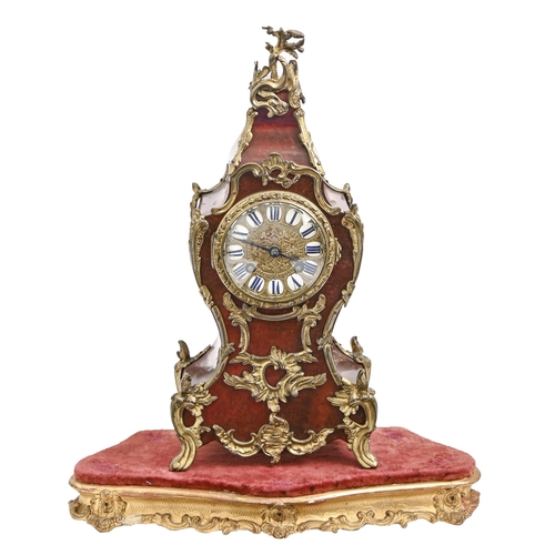 973 - A French gilt lacquered brass mounted red lacquered mantel clock, late 19th c, in Louis XV style, go... 