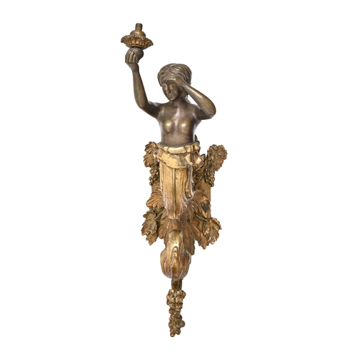 986 - A parcel gilt lacquered brass nude female demi figural gas wall light, late 19th c, of boldly scroll... 