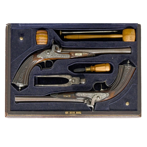 989 - A pair of Hungarian 40 bore percussion pistols, Kirner, Pest, mid 19th c, the round octagonal barrel... 