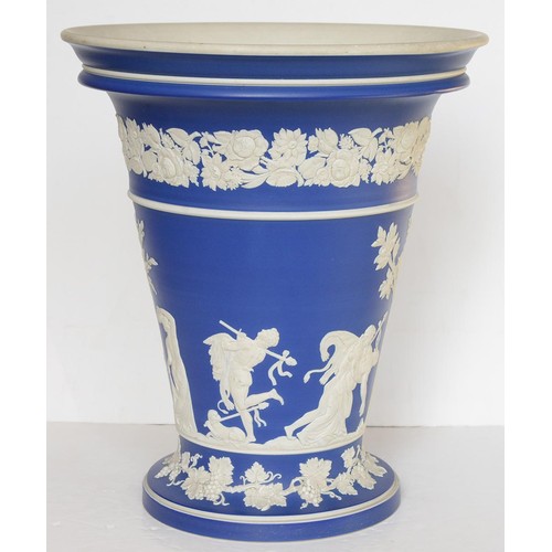 649 - A pair of Wedgwood jasper ware vases of exhibition quality, c1860, in dark blue jasper dip and ornam... 