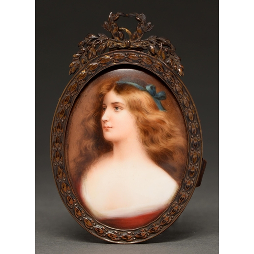 794 - A Hutschenreuter oval plaque, c1900, painted after A Asti with the head of a raven haired beauty, 82... 