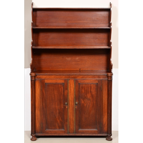 1213 - A Victorian mahogany 'waterfall' bookcase, the lower part enclosed by panelled doors flanked with re... 