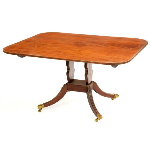 1224 - A George IV mahogany breakfast table, the oblong top on profile uprights, platform and swept legs wi... 