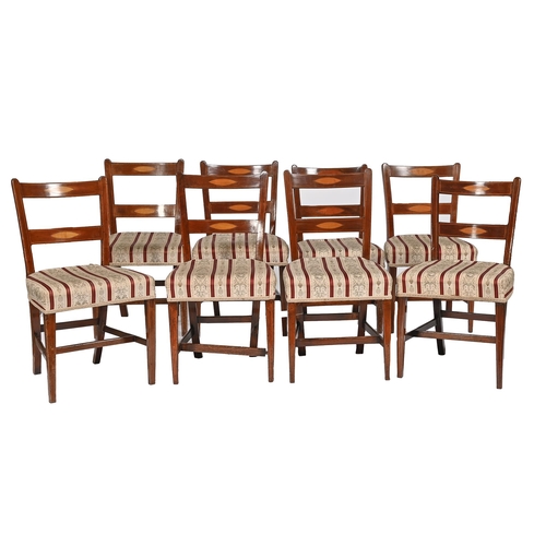 1227 - Eight early Victorian mahogany and inlaid dining chairs, the crest and back rails with satinwood ell... 