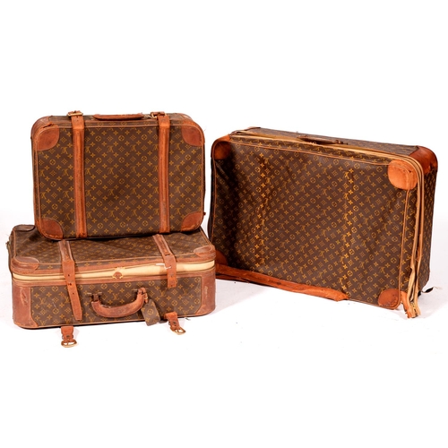 1010 - Luggage. Three Louis Vuitton suitcases, zip closure, largest approximately 80cm l