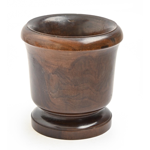 1067 - An English lignum vitae mortar, 19th c, 18cm h