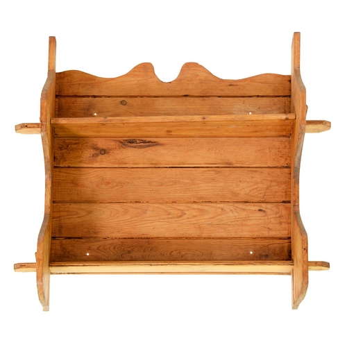 1193 - A set of three pegged and boarded waxed pine hanging shelves, 69cm h, 70cm l