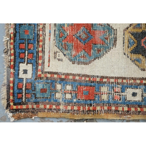 1210 - An antique Caucasian runner, 110 x 335cm