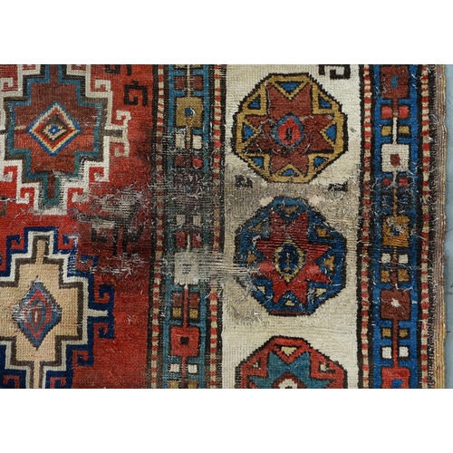 1210 - An antique Caucasian runner, 110 x 335cm