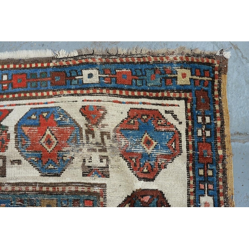 1210 - An antique Caucasian runner, 110 x 335cm