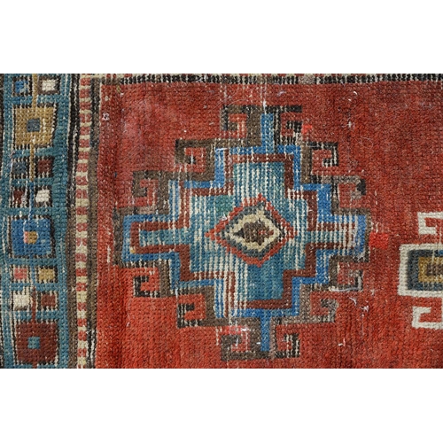 1210 - An antique Caucasian runner, 110 x 335cm