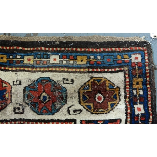 1210 - An antique Caucasian runner, 110 x 335cm