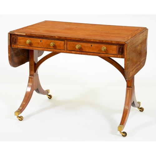 1216 - A George III satinwood, rosewood and line inlaid sofa table,  the drawers and opposing blind drawers... 