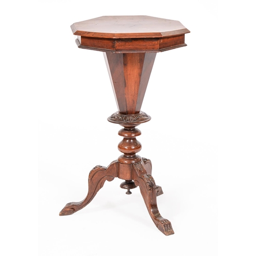 1302 - A Victorian octagonal walnut work table, on carved legs, 76cm h; 43 x 43cm