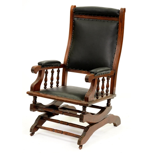 1309 - A walnut stained beech rocking chair, early 20th c