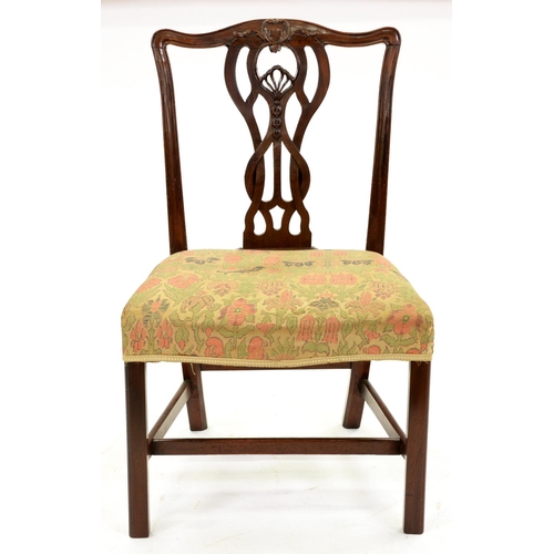 1324 - A George III mahogany dining chair, with anthemion-centred, interlaced splat, the serpentine seat on... 