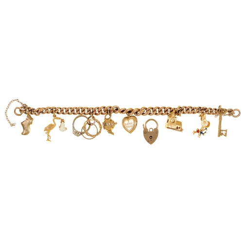 136 - A gold charm bracelet, adapted from a 9ct gold albert, 17cm l, 36g