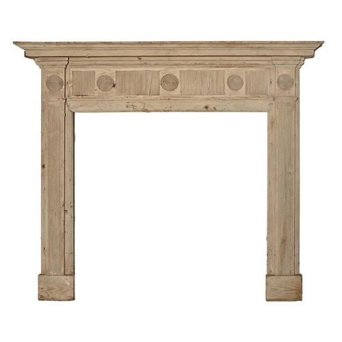 1372 - A  late Victorian pine chimneypiece, with geometric reeding,  128cm h,  x 147cm l (94 x 95 inner)